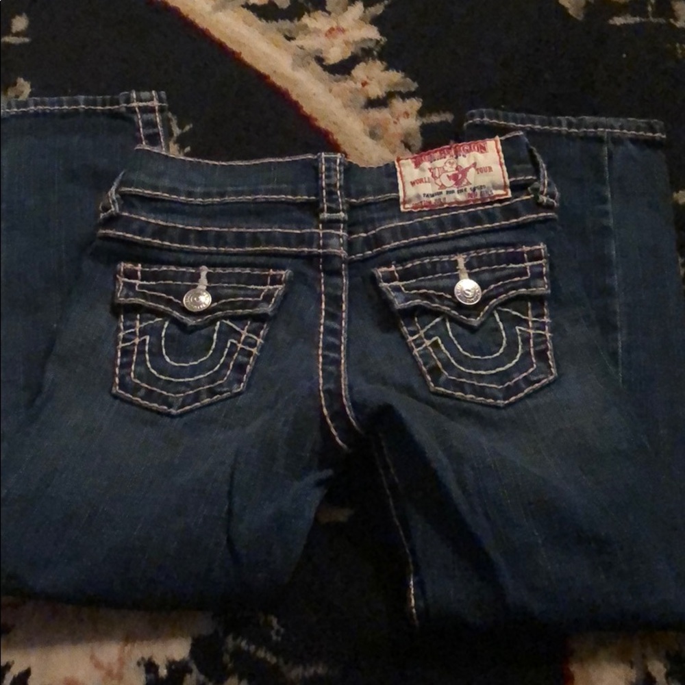 Girls true religion jeans with pink stitching